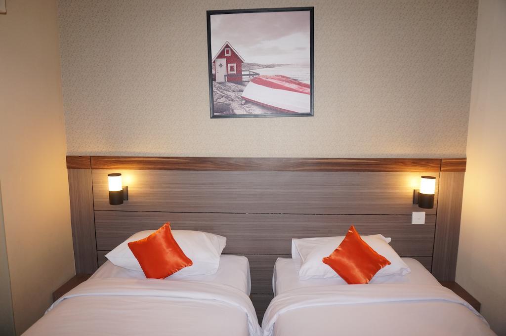 Ekon Hotel Джокьякарта Номер фото
